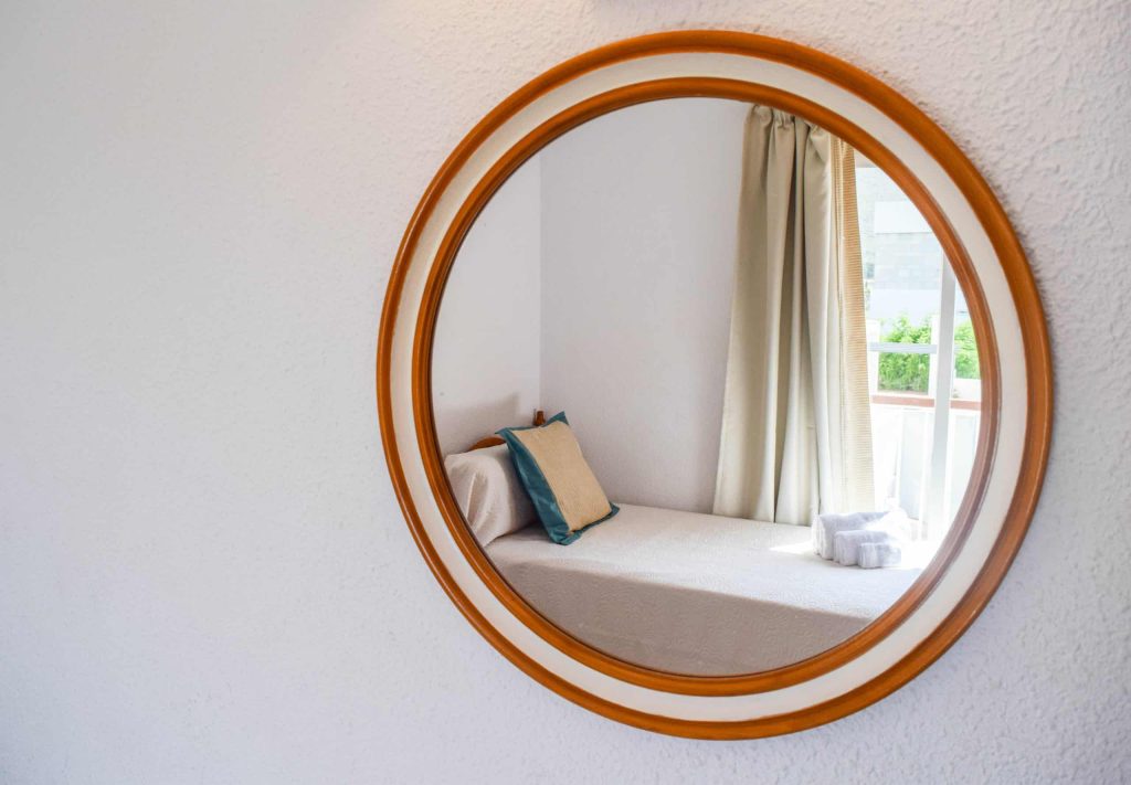 301-view-of-bedroom-through-mirror-copy-scaled